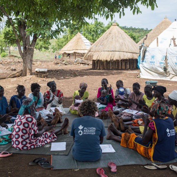 A meeting of one of Action Against Hunger's mother-to-mother support groups in Nguenyyiel Refugee Camp.