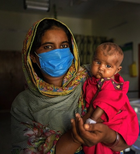 Kiran, a mother of a malnourished 6 month old baby girl named Ruksana, has been receiving treatment for her child from Action Against Hunger.